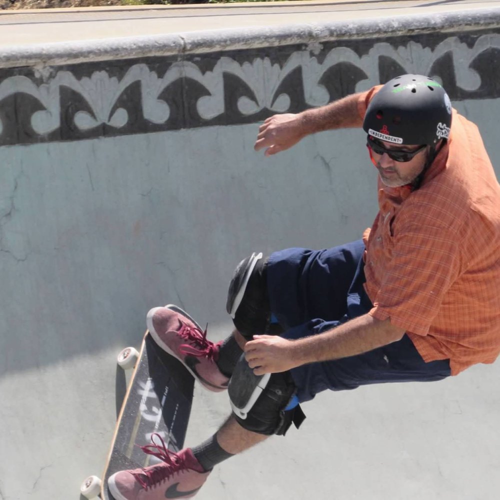Jack Rannazzisi carving a bowl on his skateboard